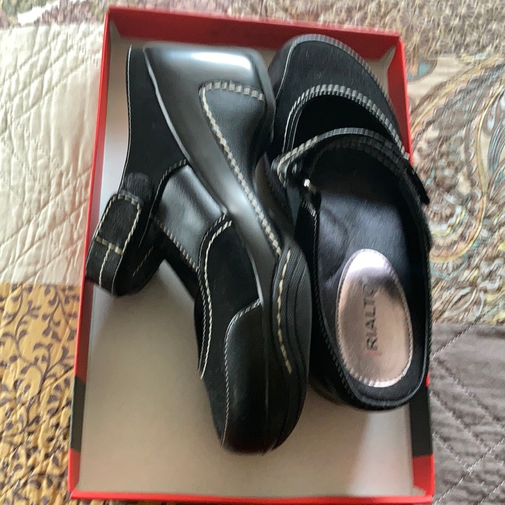 Black strap mule heel by Rialto.